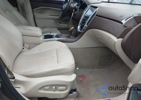 2015 Cadillac Srx Luxury Collection z USA, uszkodzony, nr VIN 3GYFNBE34FS571979